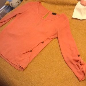 Long sleeve coral shirt with buttons down the side